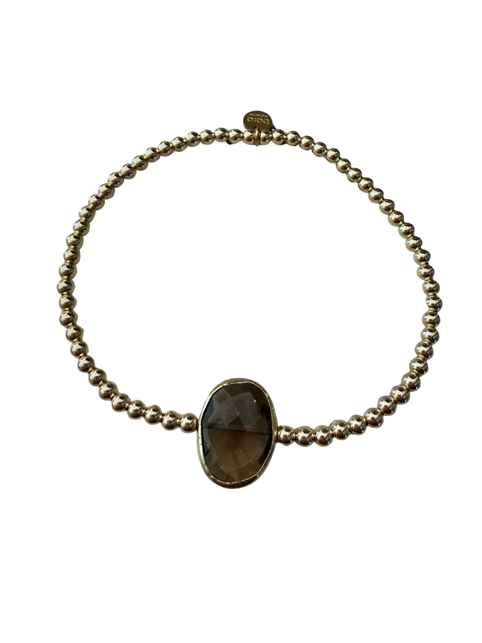 Gold filled beaded Bracelet with a smokey quartz stone on a white background